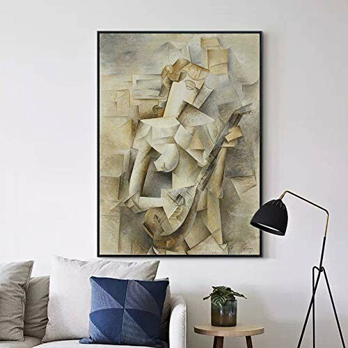 Cubist painting of a guitar on a wall above a sofa.