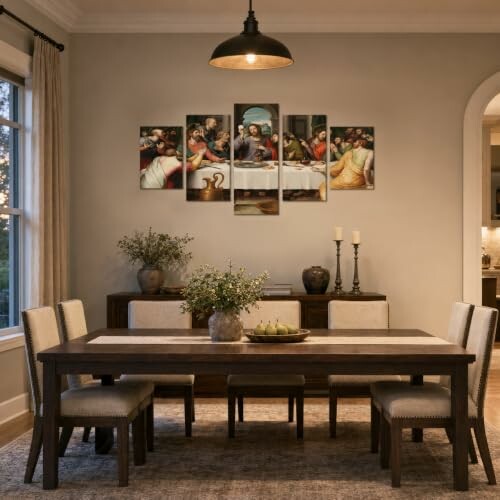 Dining room with a wooden table, chairs, wall art, and decor.