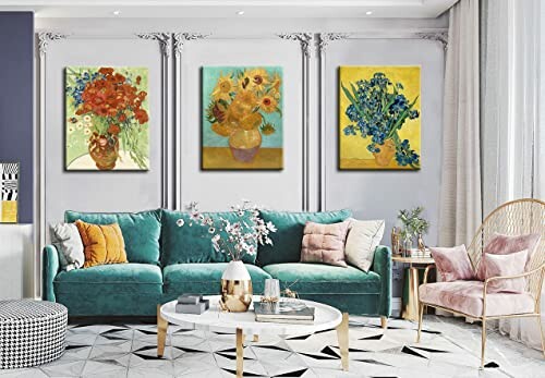 Living room with three floral paintings above a green sofa.
