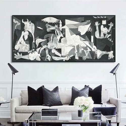 Living room with Guernica artwork on the wall above a sofa.