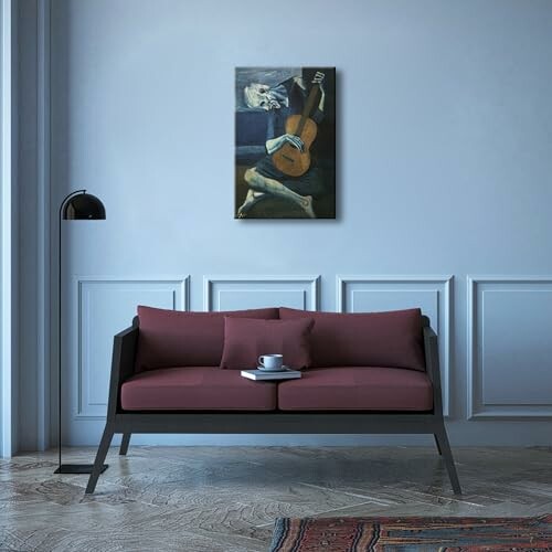 Modern living room with red sofa and wall art